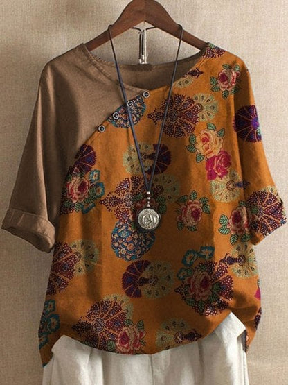 Loose-fitting blouse with floral sleeve